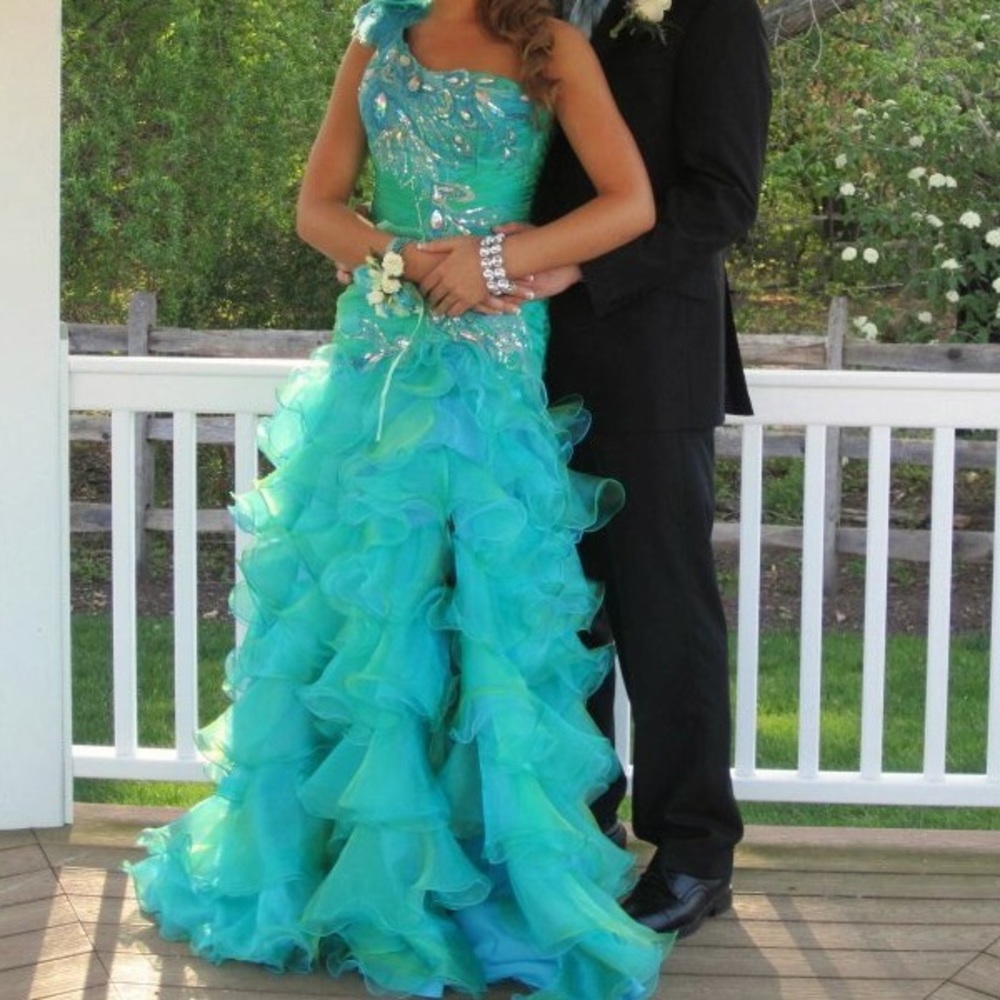 Peacock prom dress by Blush Prom